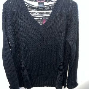 Ripped styled sweater
